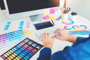 midsection-design-professional-using-computer-desk-min